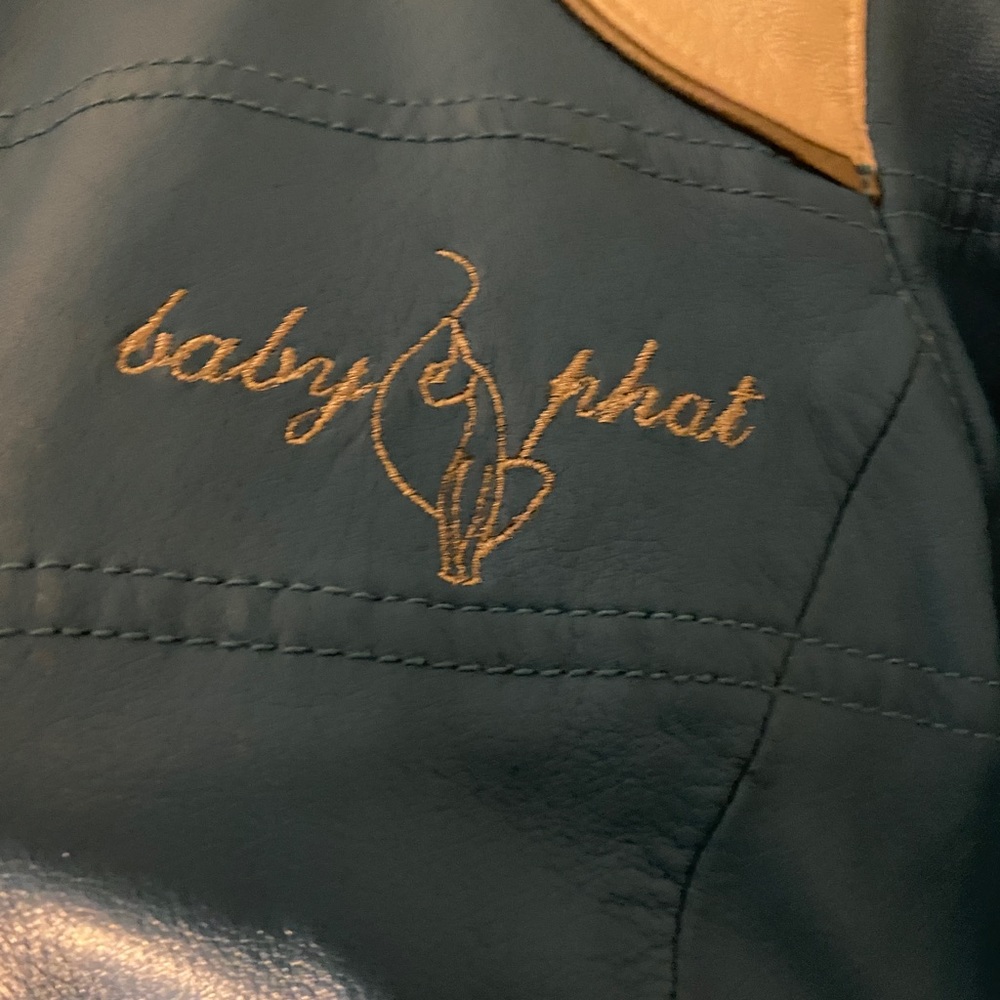 Baby Phat Moto Jacket, with minor imperfections. Please see video for reference.